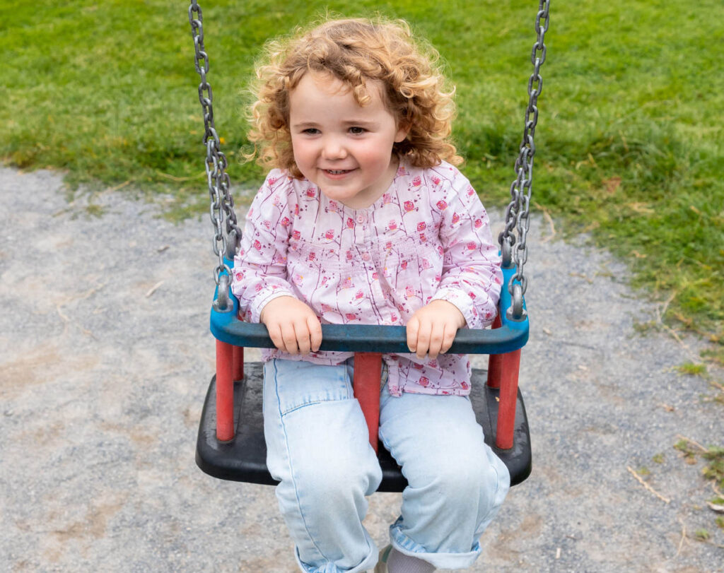 child on swing